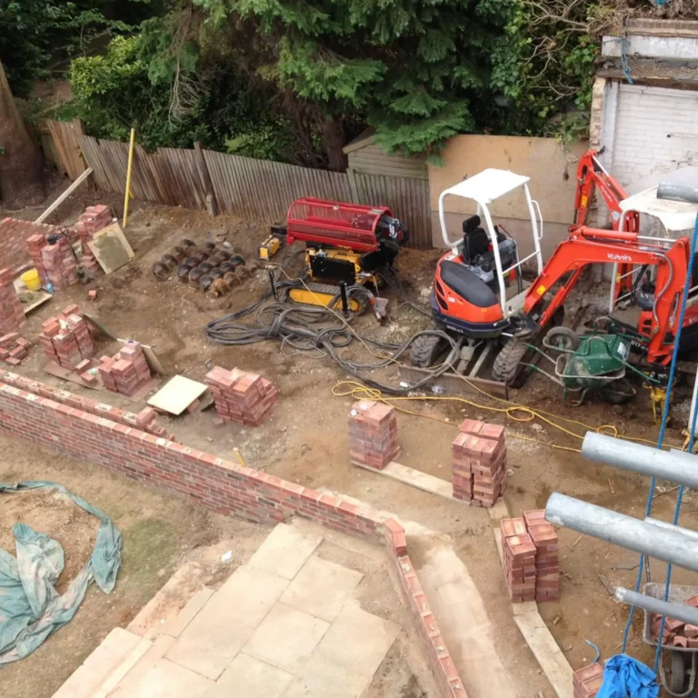 Mini excavator on a foundation site in Elstree.
