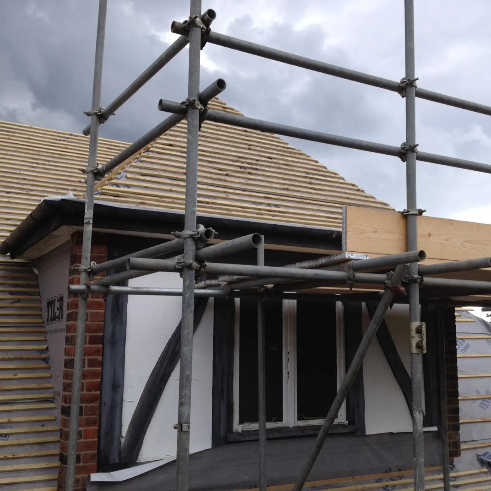Scaffolding on a building for a Bayford foundation project.