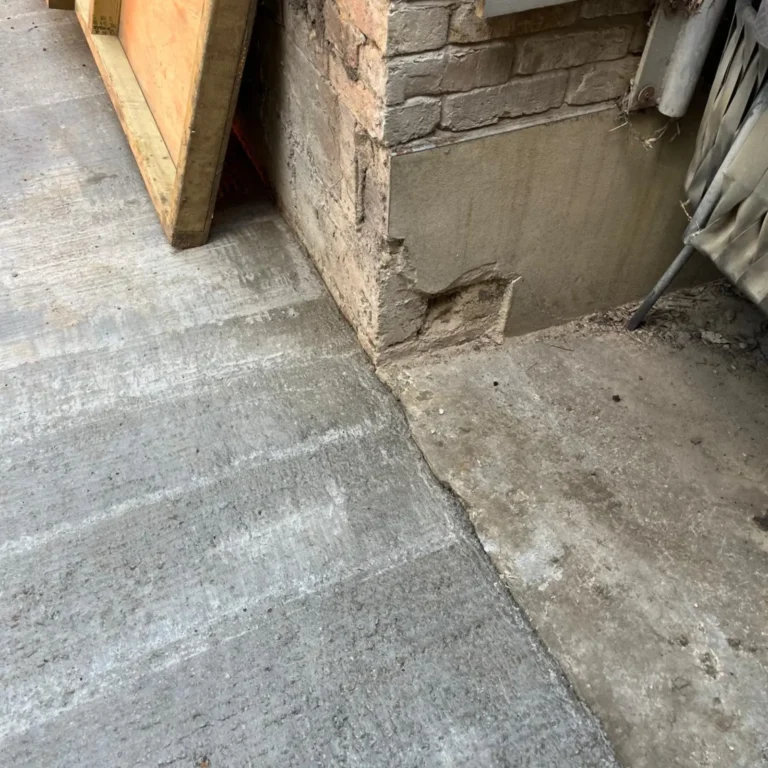 A damaged foundation being assessed in Borehamwood.