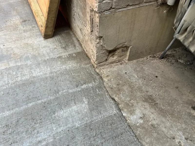 A damaged foundation being assessed in Borehamwood.